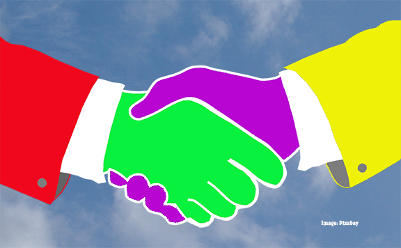 Image shows a handshake between a purple hand and a green hand.