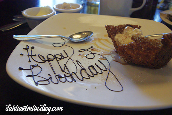 "Happy Birthday" is written in chocolate on a dessert plate at the Grand Marlin restaurant on Pensacola Beach. Photo by Auriette Lindsey.
